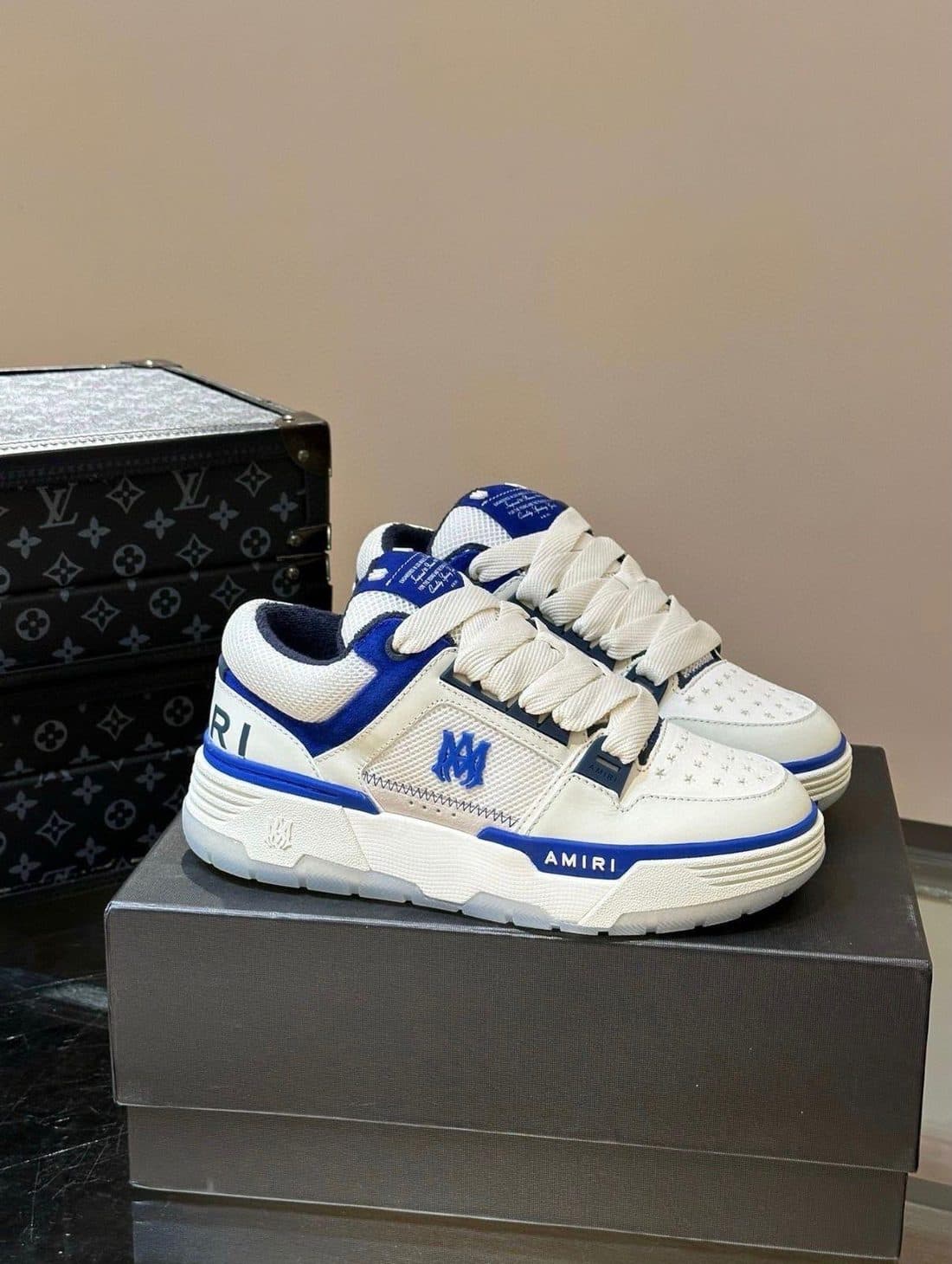 AMIRI MA-1 Sneaker in White / Blue — front