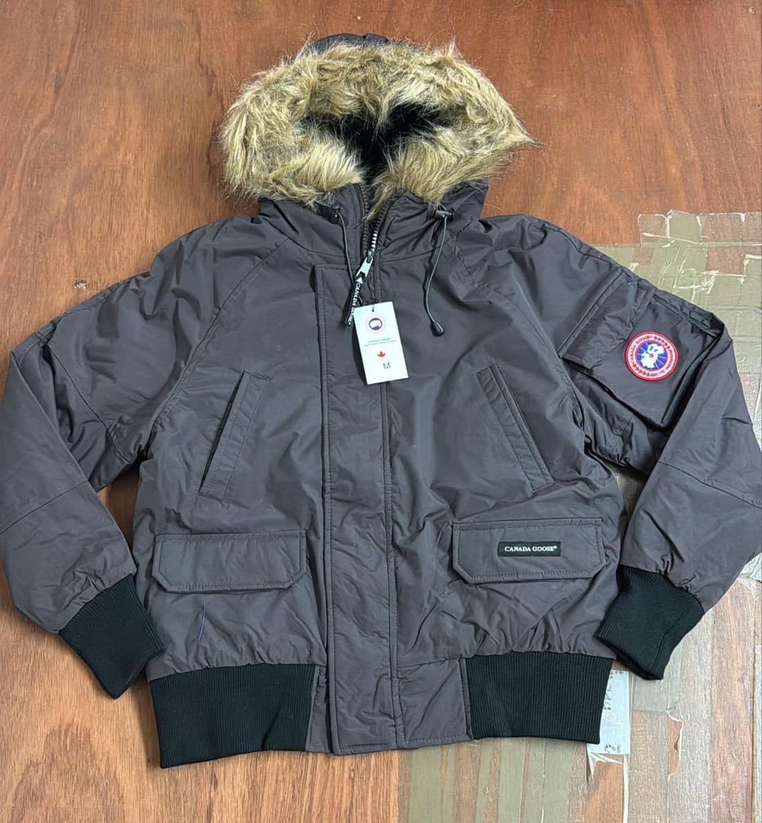Canada Goose Fur Hood Bomber Jacket in Grey — front