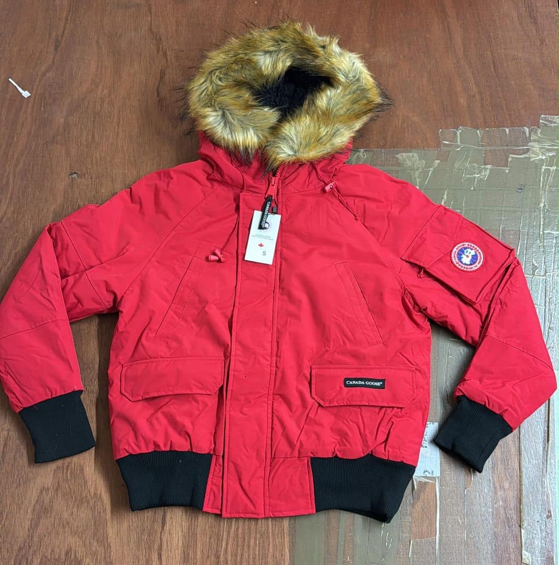 Canada Goose Fur Hood Bomber Jacket in Red — front