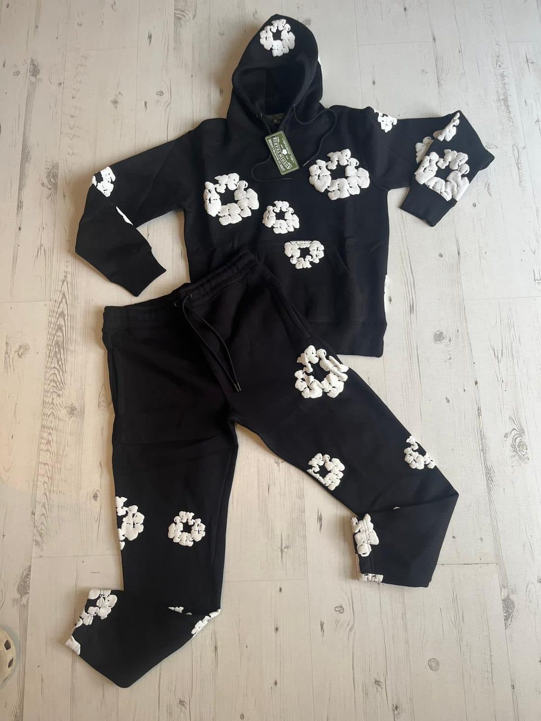 Denim Tears Cotton Wreath Tracksuit in Black — front