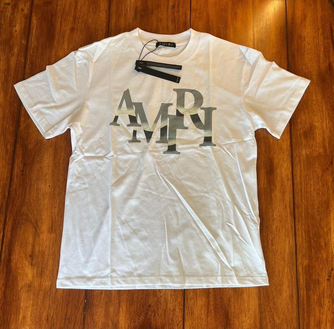 AMIRI Gradient Wordmark Tee in White — front