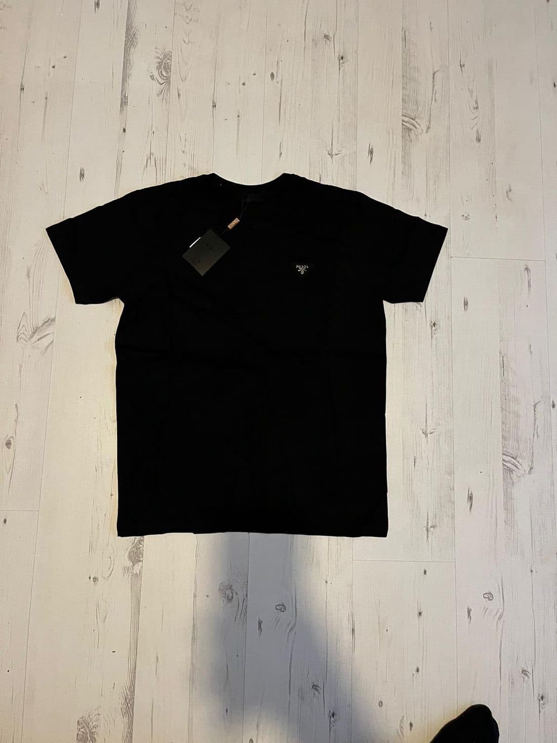 Prada Triangle Logo Tee in Black — front