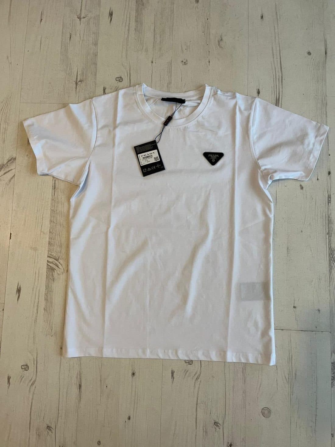Prada Triangle Logo Tee in White — front