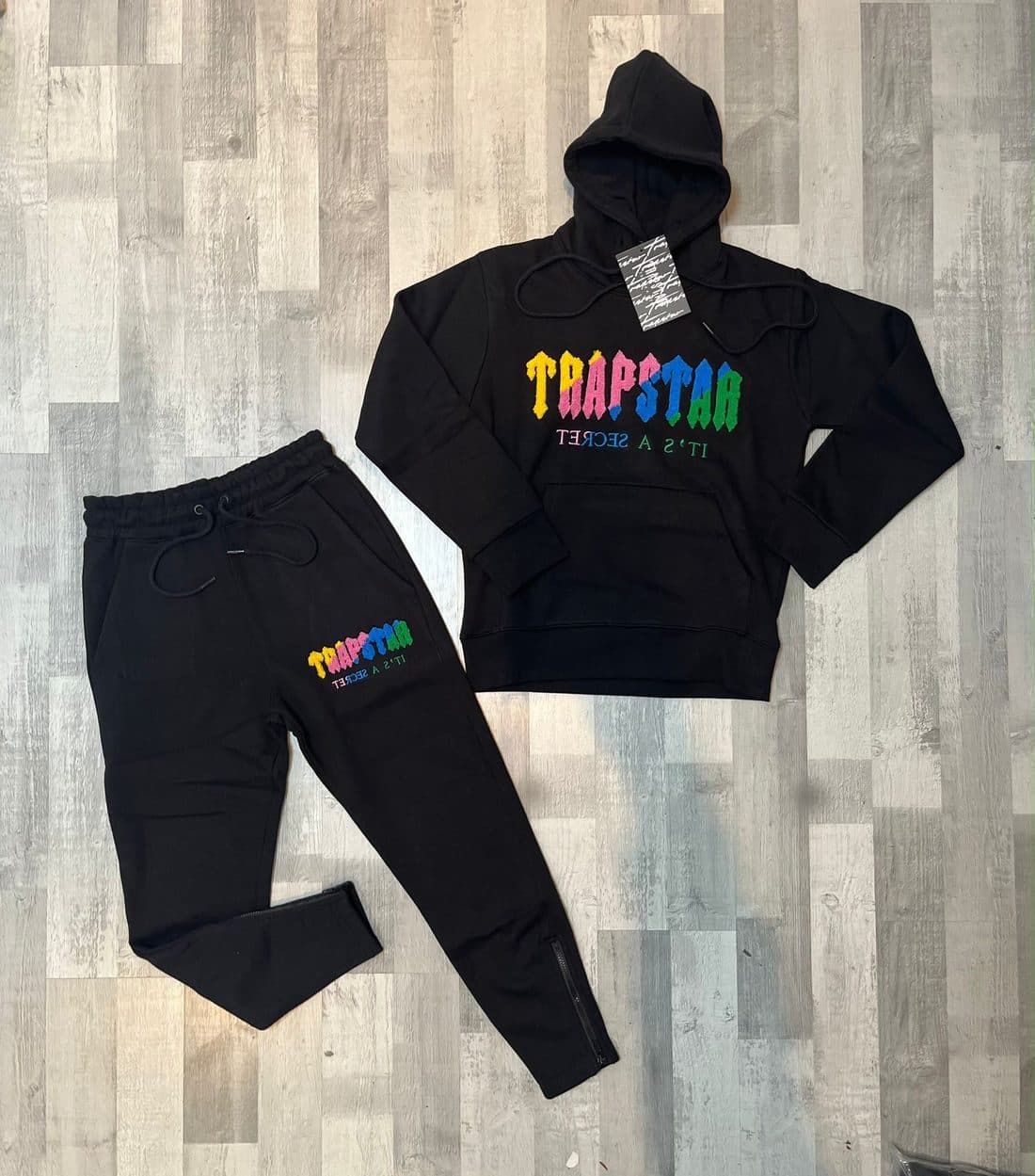 Trapstar It's A Secret Tracksuit — Multicolour in Black — front