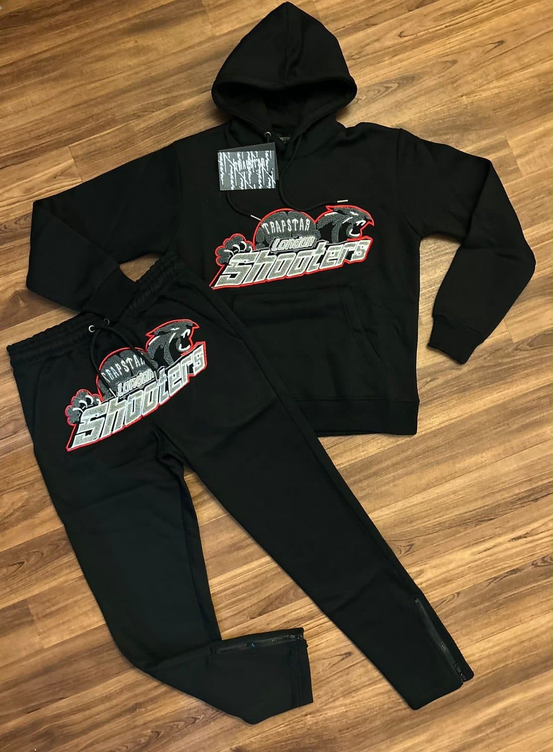 Trapstar London Shooters Tracksuit in Black / Red — front